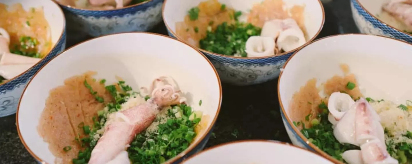 Kien Xay "stirring" rice noodles